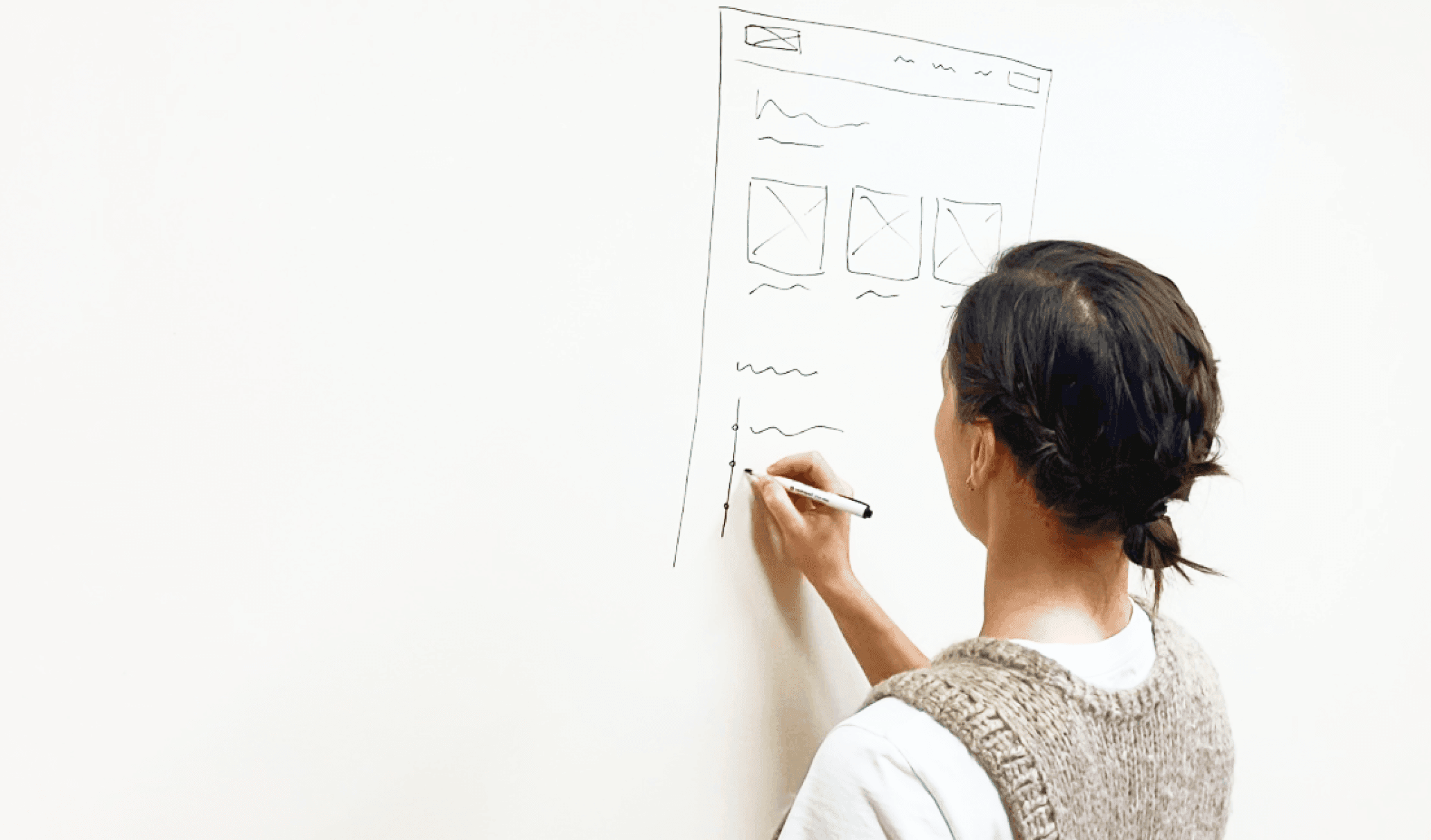 Woman drawing UX design